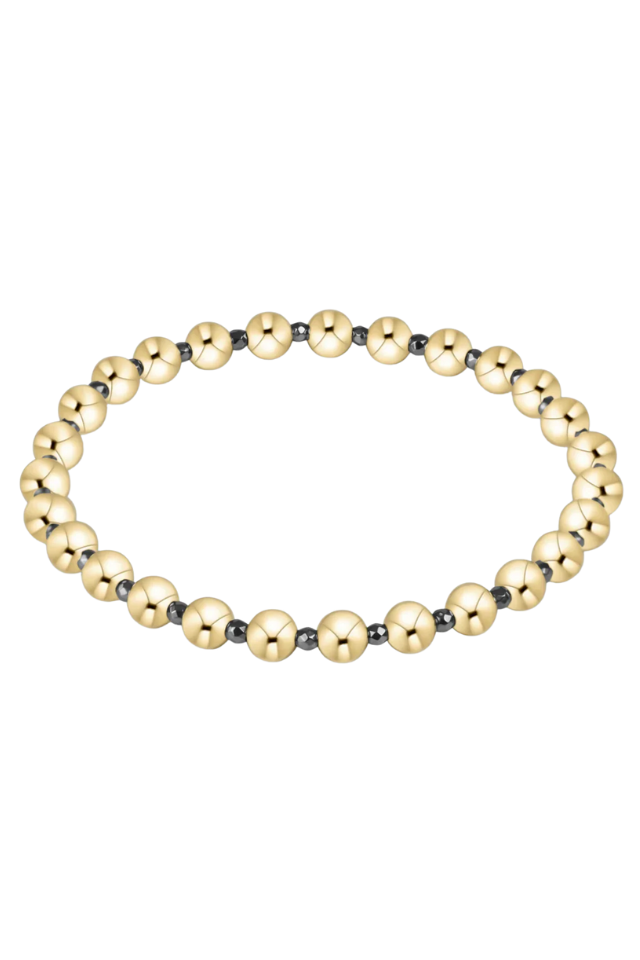 Gold beaded bracelet on a white background. enewton. 14k gold, tarnish free. low price. 