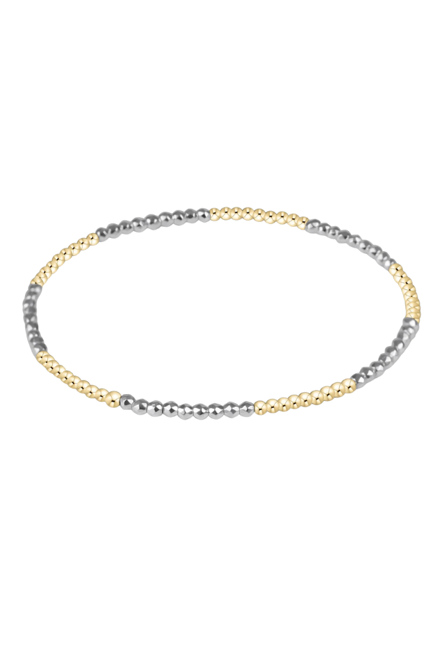 Three-tone beaded bracelet on a white background. gold. silver. enewton. tarnishfree. metallic. stackable. bracelets.