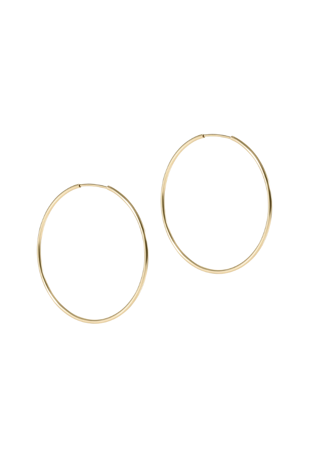 Gold hoop earrings on a white background. Gold beaded bracelet on a white background. enewton. 14k gold, tarnish free. low price. 
