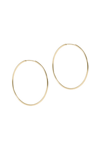 Gold hoop earrings on a white background. Gold beaded bracelet on a white background. enewton. 14k gold, tarnish free. low price. 